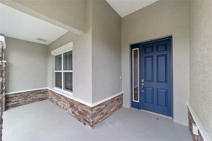 Exterior details and patio area of a home in On Top of the World Communities, Ocala (Image 4).