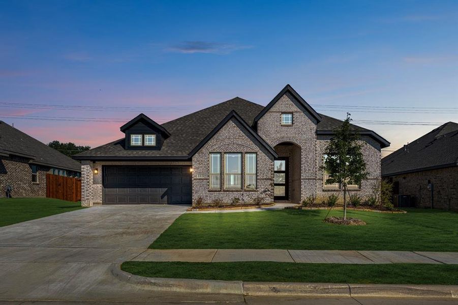 Front exterior of a new home in Arcadia Trails Classic 60, Balch Springs, TX, highlighting curb appeal (Image 17). Front exterior of a new home in Arcadia Trails Classic 60, Balch Springs, TX, highlighting curb appeal (Image 17).