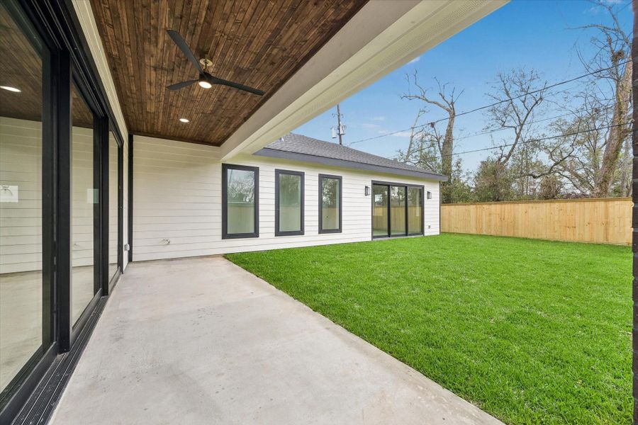 Exterior details and patio area of a home in , Houston (Image 3).