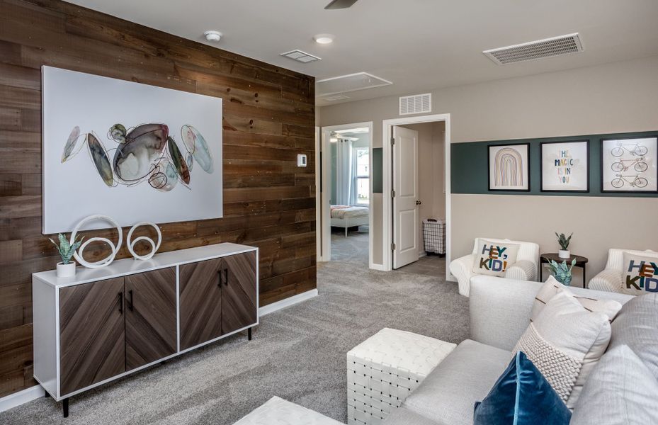 Furnished interior view inside a new home in Exchange at 401, Raleigh (Image 21).