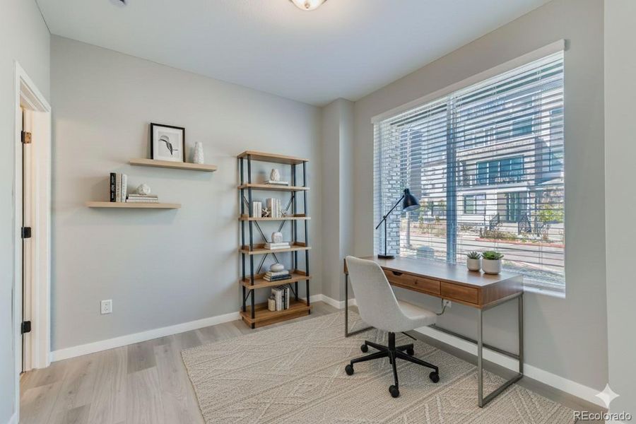 Staged main level bedroom. Photos are not of actual home.