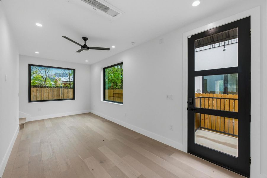 Spare room featuring light wood-type flooring, recessed lighting, and a ceiling fan Spare room featuring light wood-type flooring, recessed lighting, and a ceiling fan