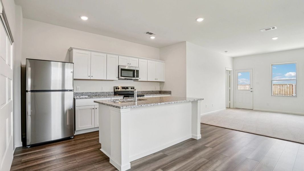 Representative furnished interior of a home built from the Athena by Starlight Homes in Creekview Fossil Ridge, Pilot Point (Image 8).