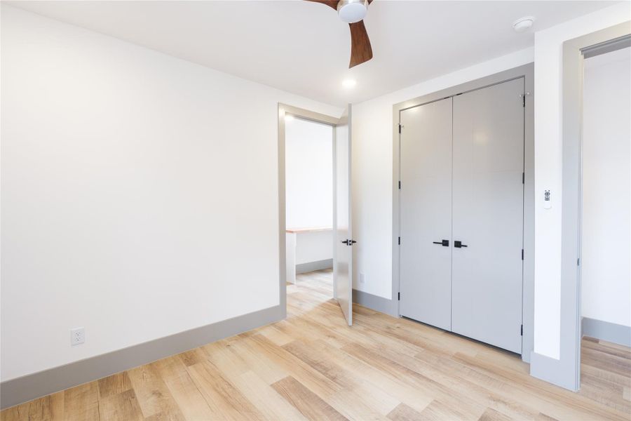 Representative Bedroom View (Design selections and colors may vary): The first level bedroom is both cozy and practical featuring a sizeable closet, en-suite bath and kitchenette.  A versatile space providing increased flexibility and privacy,  perfect for guests or family members with an extended stay or short term rentals.