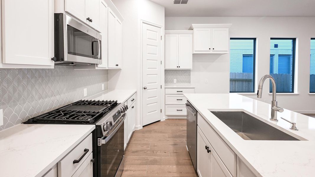 Furnished interior view inside a new home in Crosswinds, Kyle (Image 19).