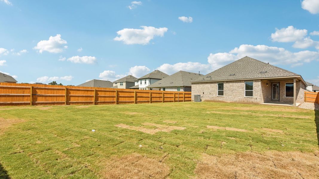 Exterior details and patio area of a home in Rosenbusch Ranch, Leander (Image 25).