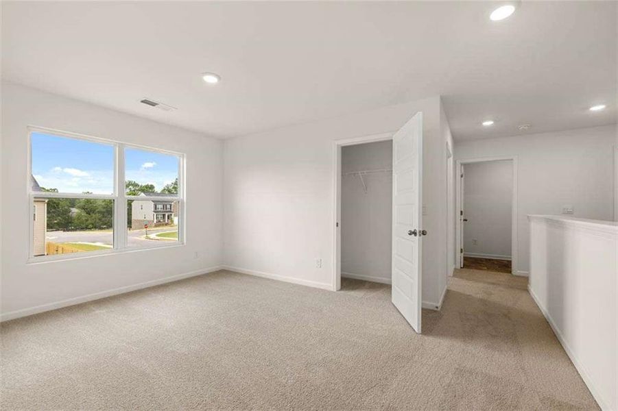 Spacious, unfurnished interior of a new home in The Reserve at Calcutta, Stockbridge (Image 22).