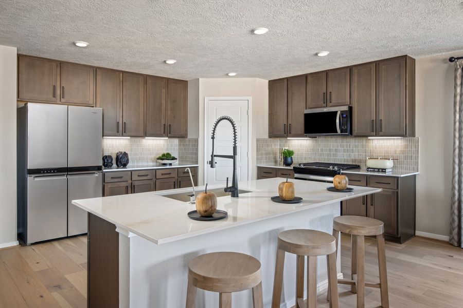 Representative furnished interior of a home built from the 2382 Modeled by KB Home in Brighton Preserve, Hockley (Image 7).