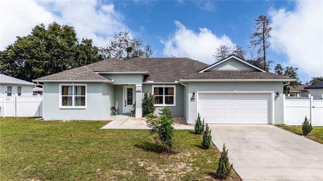 Front exterior of a new home in , Ocala, FL, highlighting curb appeal (Image 20).