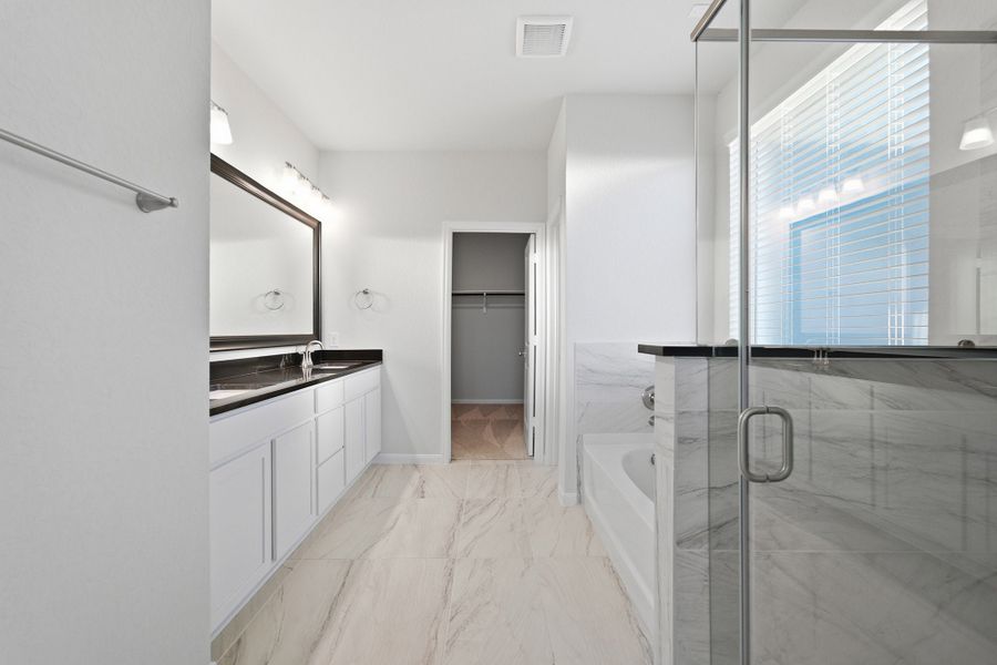 Furnished interior view inside a new home in The Woodlands at Medina Hills, Mico (Image 11).