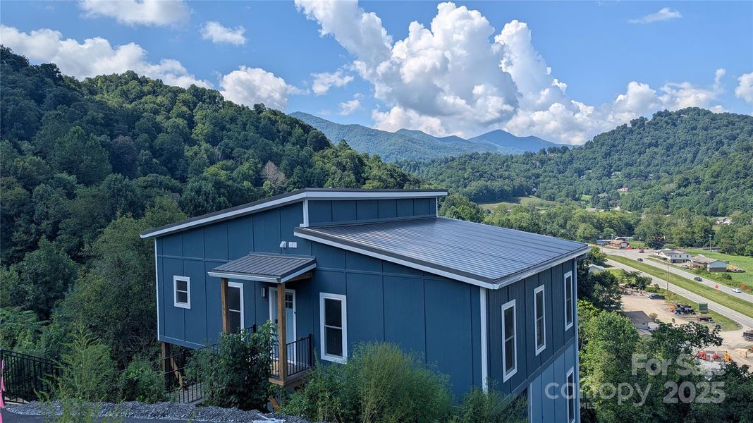Front exterior of a new home in , Waynesville, NC, highlighting curb appeal (Image 2).