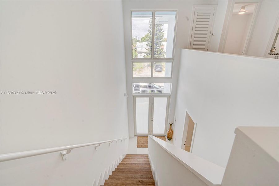Stairs to the second floor leading to Master bedroom as well as two other bedrooms and one additional bathroom Stairs to the second floor leading to Master bedroom as well as two other bedrooms and one additional bathroom