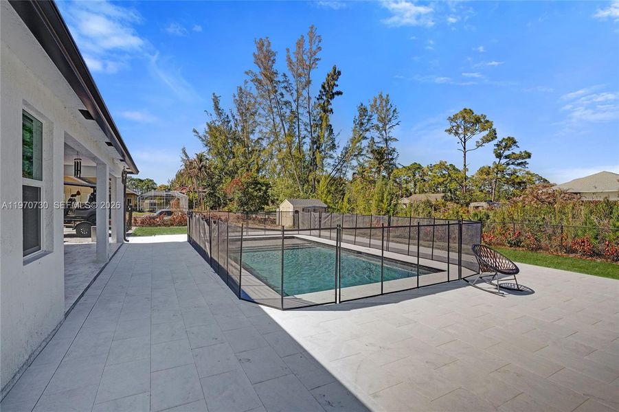 Exterior details and patio area of a home in , Loxahatchee (Image 40).