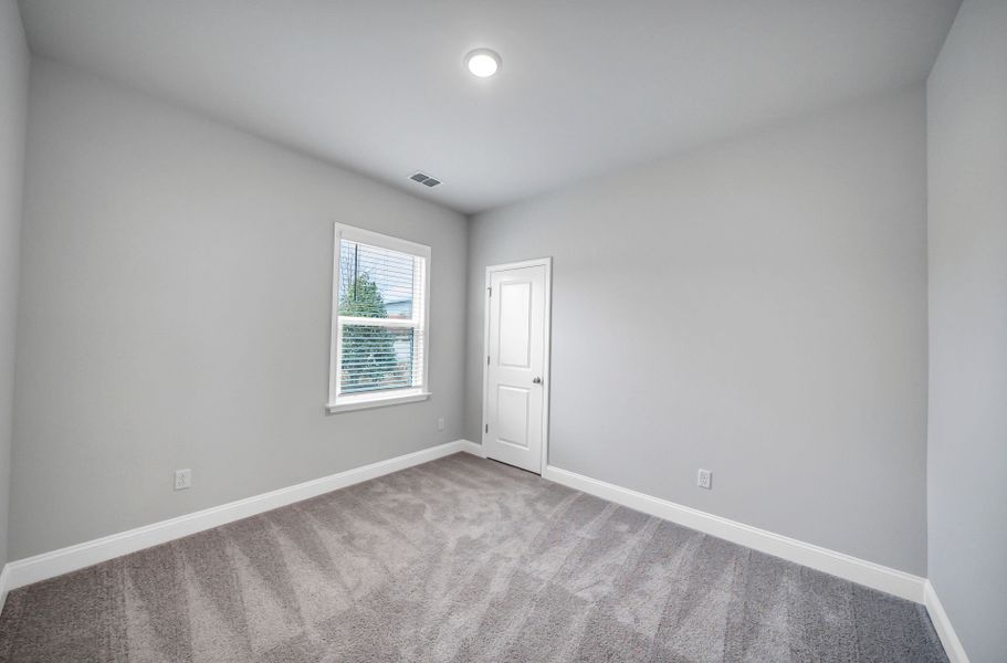Spacious, unfurnished interior of a new home in Monroe Preserve, Chapin (Image 62).