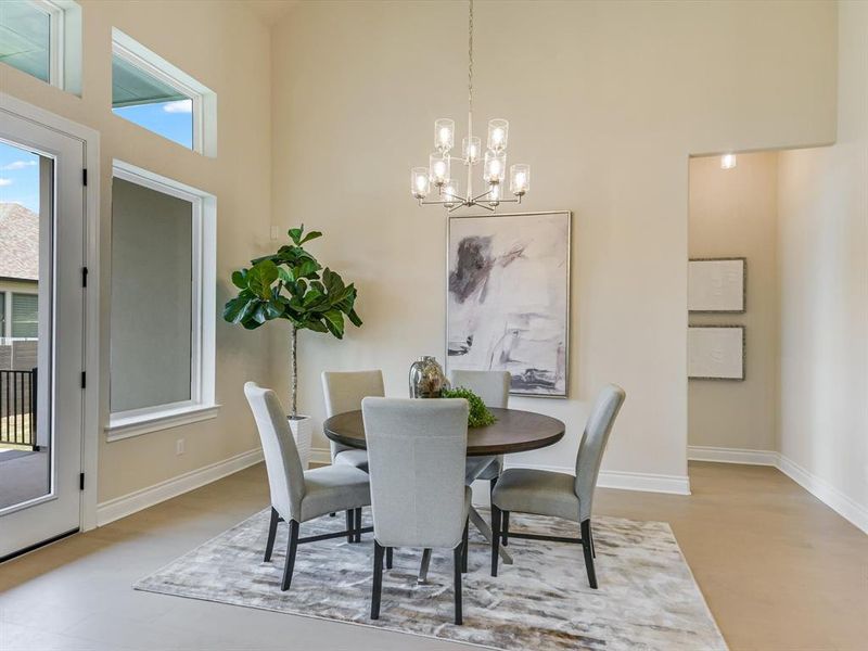 The dining area offers plenty of space for a buffet credenza, and easily accommodates a rectangle or round table.