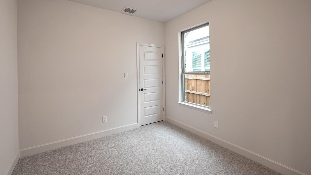 Spacious, unfurnished interior of a new home in 6 Creeks, Kyle (Image 17).