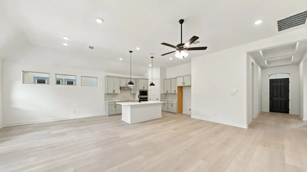 Furnished interior view inside a new home in Oaks at San Gabriel, Georgetown (Image 24).