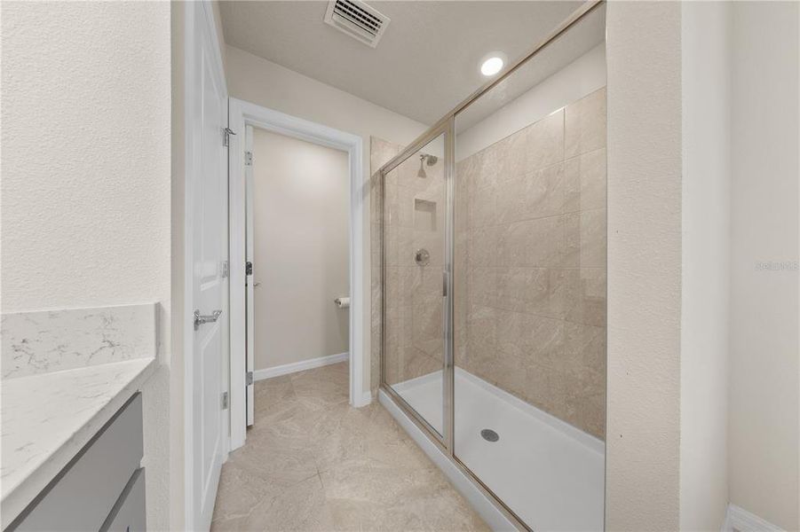 Furnished interior view inside a new home in EverBe, Orlando (Image 11).