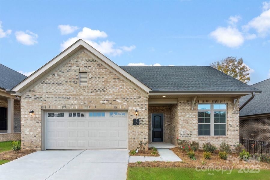 Front exterior of a new home in The Courtyards on New Hope, Gastonia, NC, highlighting curb appeal (Image 2).