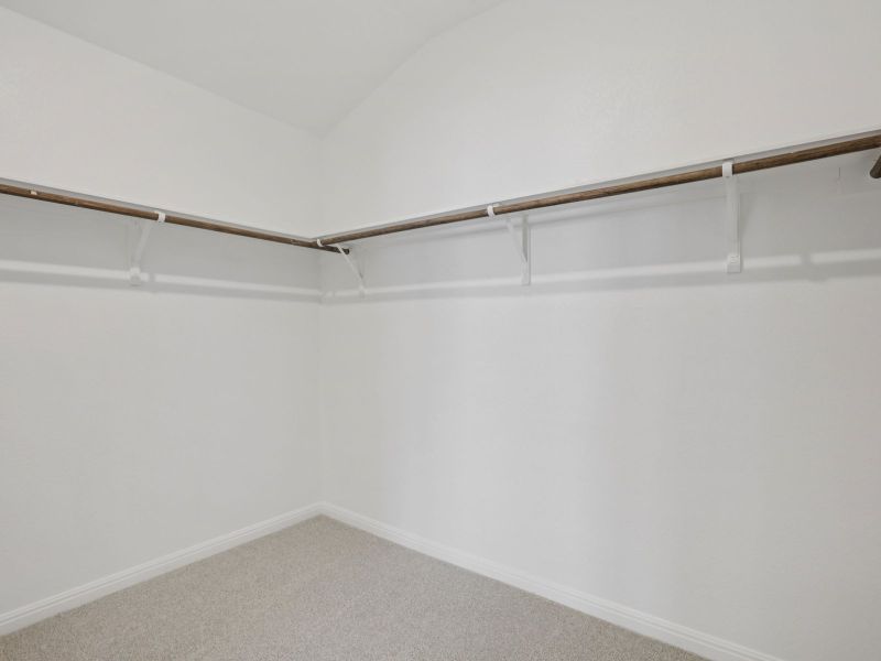Spacious, unfurnished interior of a new home in Big Sky Ranch - Reserve Collection, Dripping Springs (Image 9).