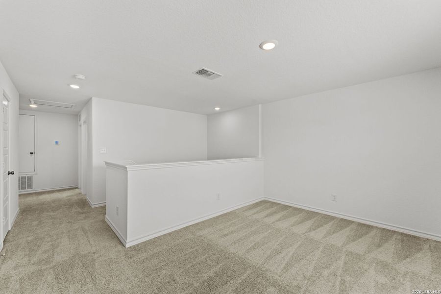 Spacious, unfurnished interior of a new home in Dove Song, Marion (Image 18).