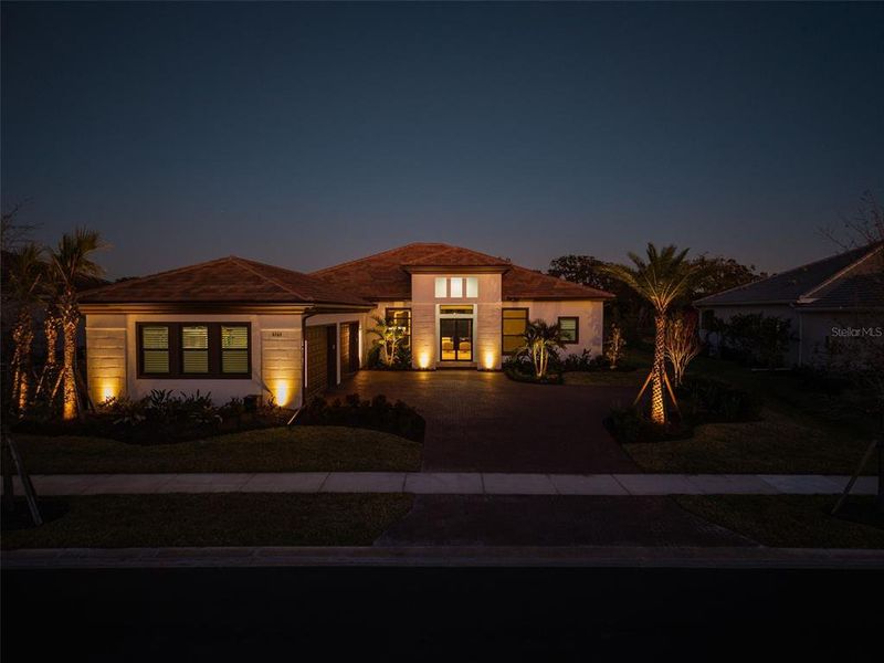 Front exterior of a new home in , Sarasota, FL, highlighting curb appeal (Image 27).
