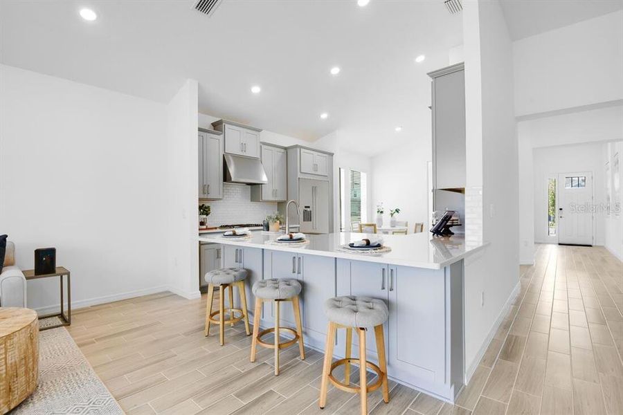 Furnished interior view inside a new home in Ardisia Park, New Smyrna Beach (Image 6).