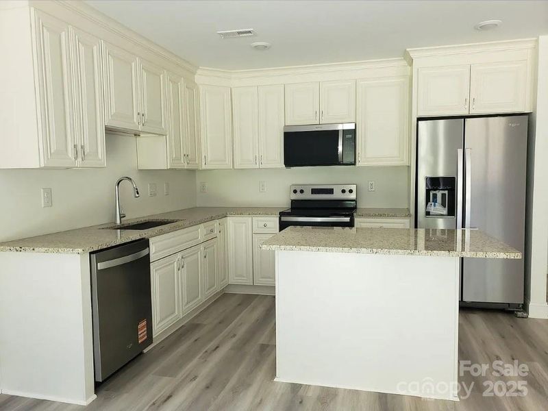 Furnished interior view inside a new home in , Charlotte (Image 4). Furnished interior view inside a new home in , Charlotte (Image 4).