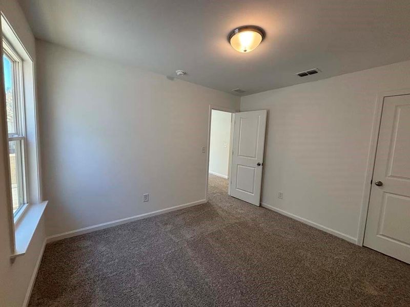 Spacious, unfurnished interior of a new home in Creekside, Dawsonville (Image 28).