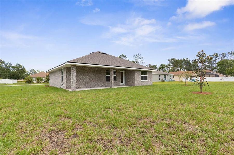 Exterior details and patio area of a home in Palm Coast, Palm Coast (Image 21).