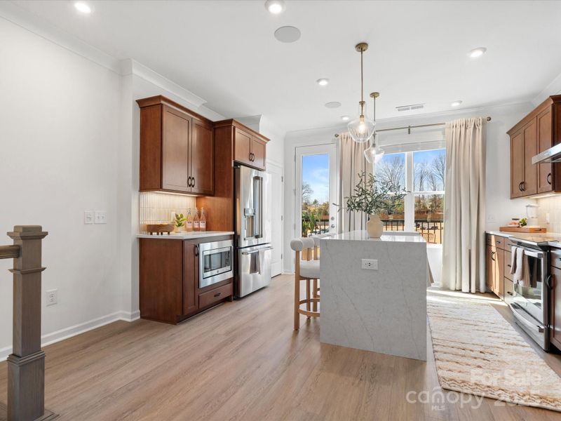 Large Central Waterfall Island Ideal for Entertaining or Casual Dining.