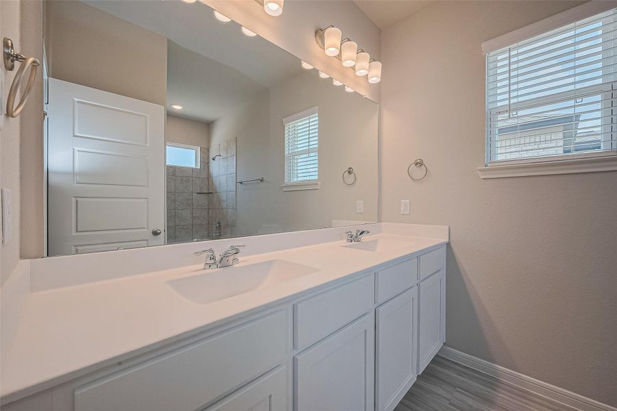 Furnished interior view inside a new home in Sunterra, Katy (Image 4).