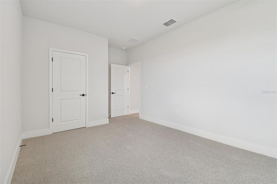 Spacious, unfurnished interior of a new home in Waterset Tradition Series, Apollo Beach (Image 36).