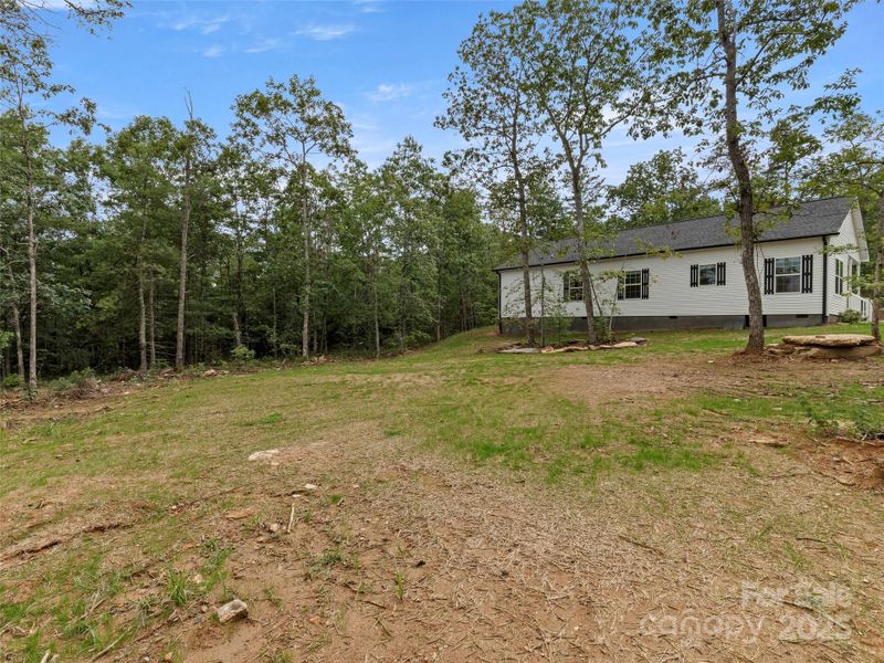 Front exterior of a new home in , Hendersonville, NC, highlighting curb appeal (Image 14).