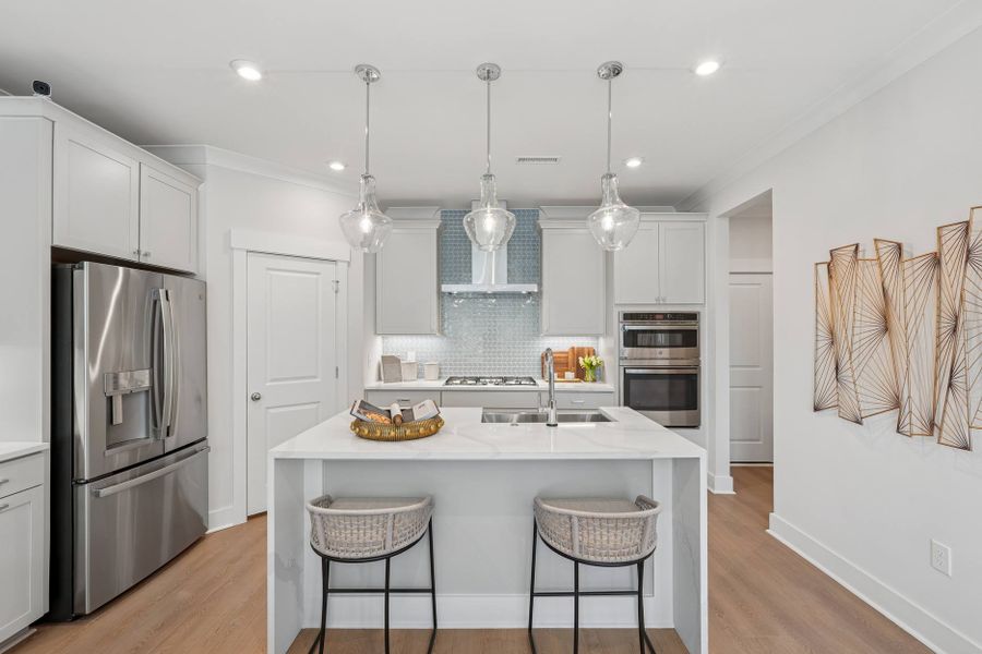 Representative furnished interior of a home built from the Sampson by Tri Pointe Homes in The Townes at NoVi, Pittsboro (Image 6).