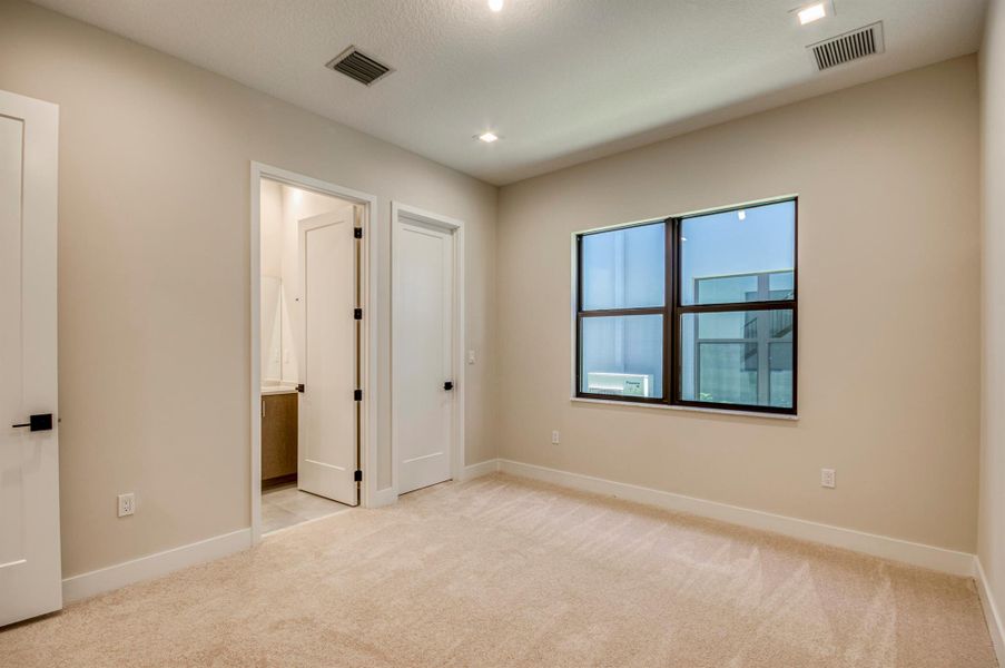 Furnished interior view inside a new home in Apex at Avenir, Palm Beach Gardens (Image 13).