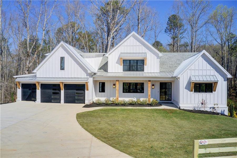 Front exterior of a new home in , Canton, GA, highlighting curb appeal (Image 27).