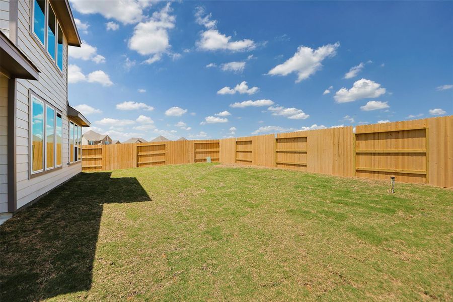 Exterior details and patio area of a home in Oakwood Estates, Waller (Image 24).