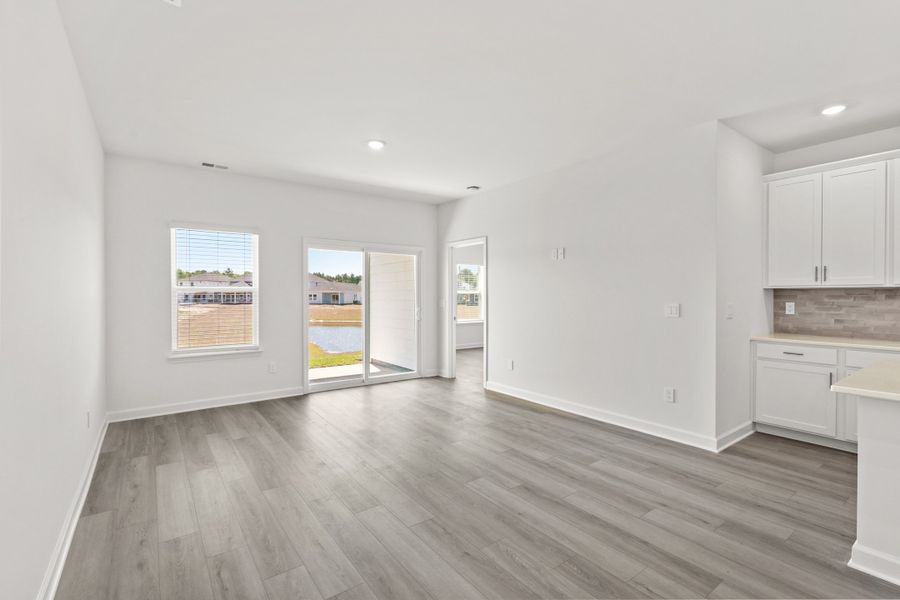 Spacious, unfurnished interior of a new home in Waterside - Boardwalk Series, Longs (Image 10).