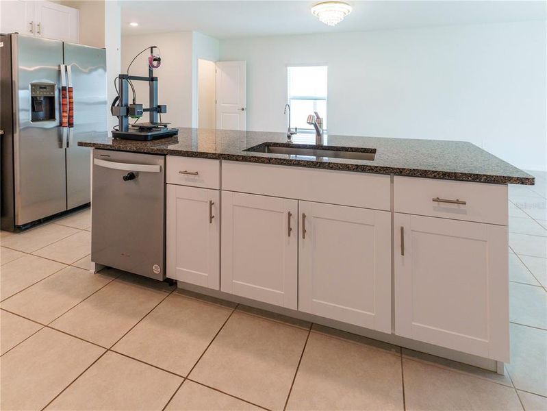Furnished interior view inside a new home in The Isle of Avalon, Spring Hill (Image 9).