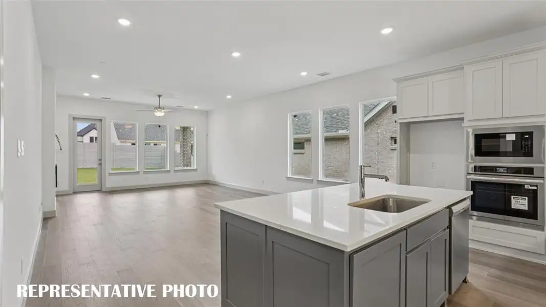 The chef in the family will never be left out of the party in this outstanding open concept floor plan!  REPRESENTATIVE PHOTO