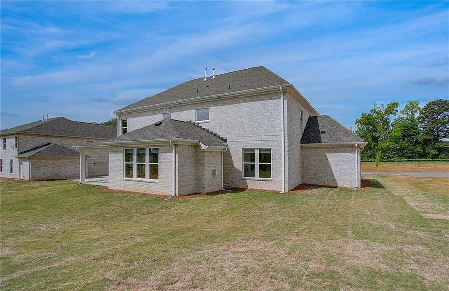 Exterior details and patio area of a home in Cambria at Traditions, Hampton (Image 4). Exterior details and patio area of a home in Cambria at Traditions, Hampton (Image 4).