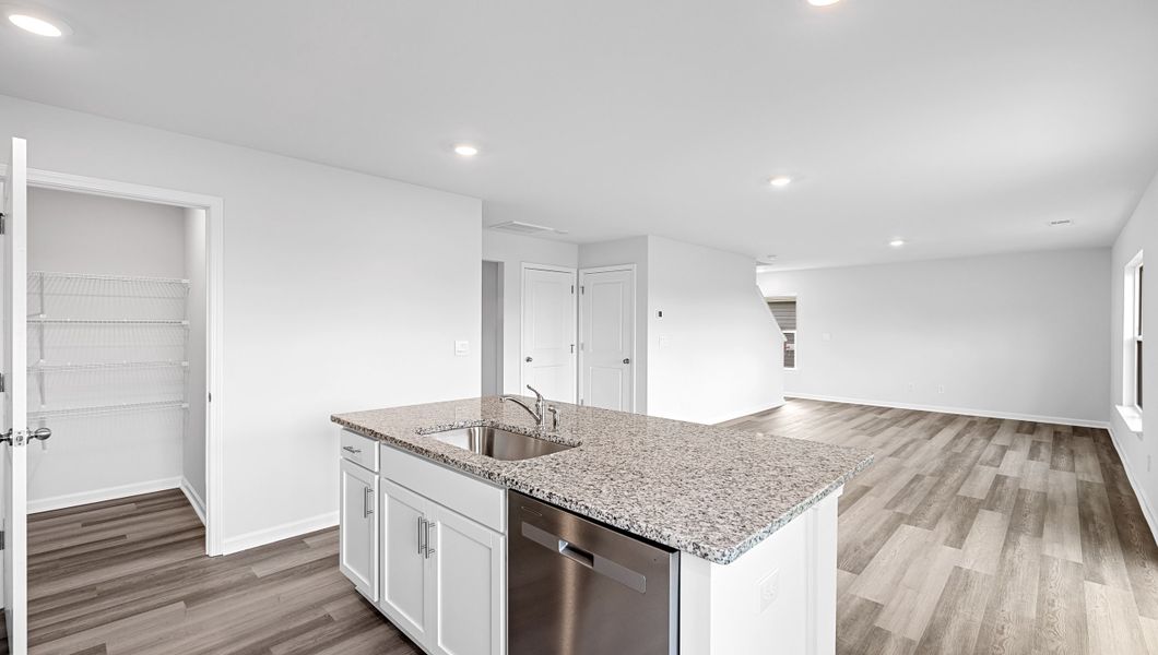 Furnished interior view inside a new home in Bentley Park, Greenwood (Image 12).