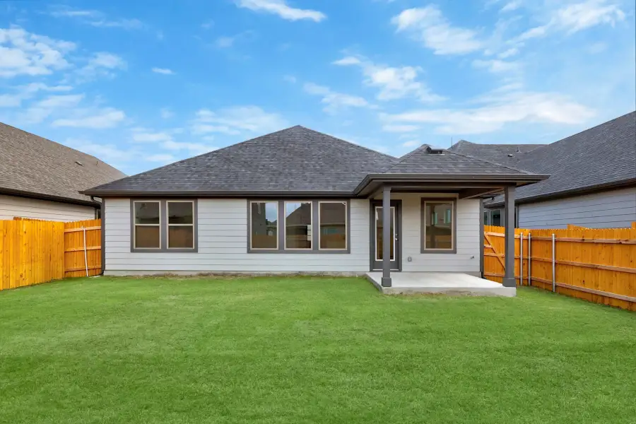 Exterior details and patio area of a home in Prairie Winds, Hutto (Image 4).