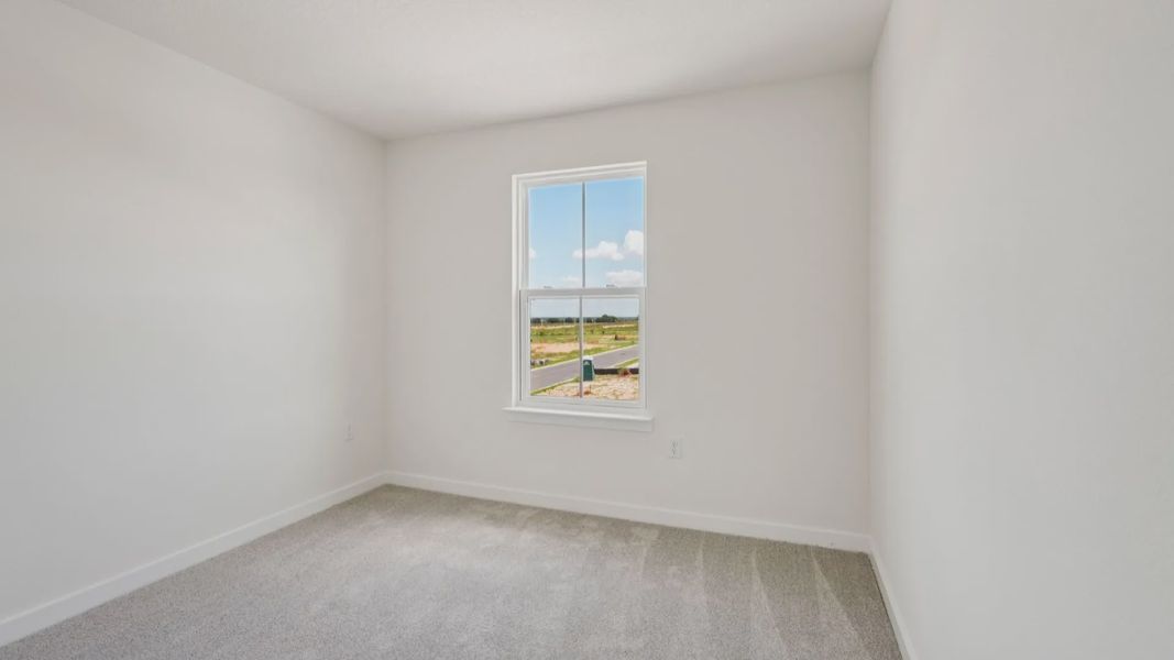 Secondary Bedroom located in the Jupiter in Hamilton Bluff located in Haines City, FL.