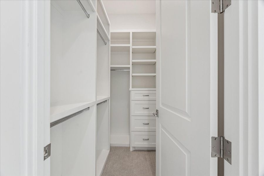 All secondary bedrooms have generously-sized closets with space for hanging, as well as drawers and shelving.