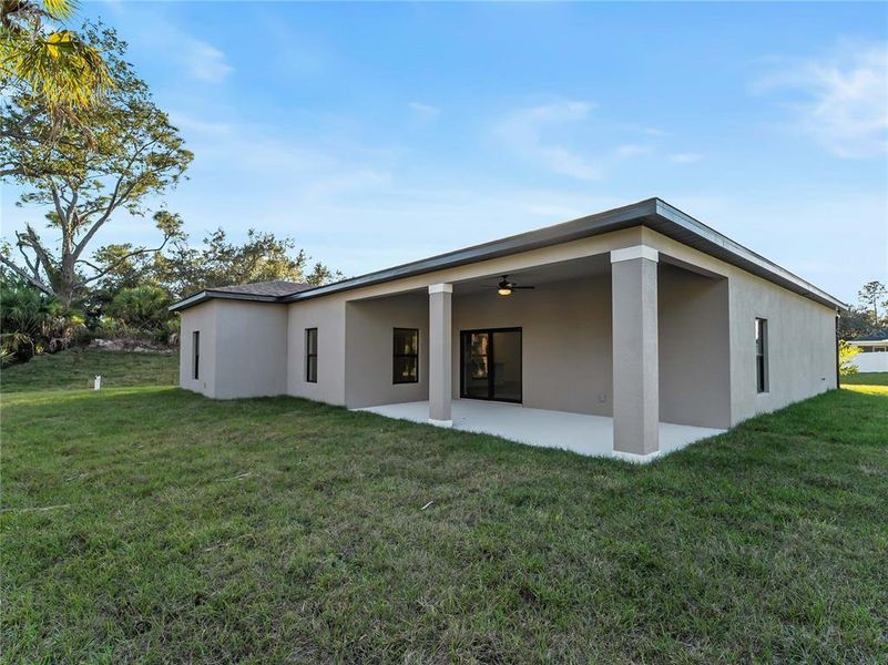 Exterior details and patio area of a home in , North Port (Image 29).