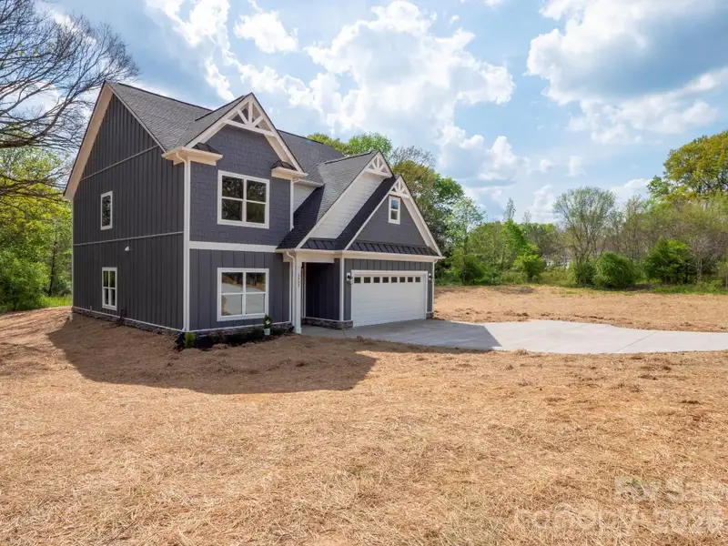 Front exterior of a new home in , Monroe, NC, highlighting curb appeal (Image 2). Front exterior of a new home in , Monroe, NC, highlighting curb appeal (Image 2).