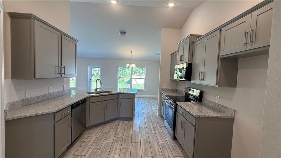 Furnished interior view inside a new home in North Port, North Port (Image 4).