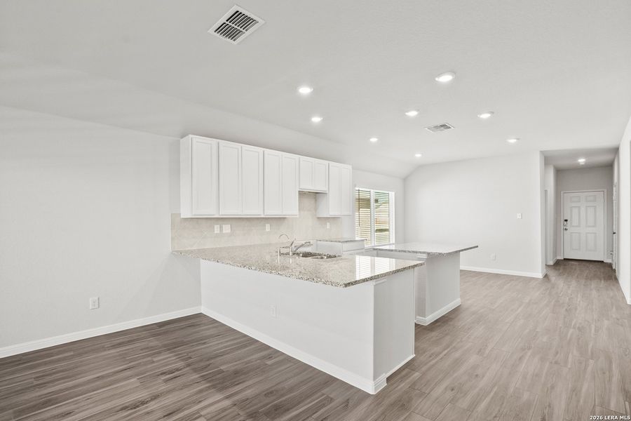 Furnished interior view inside a new home in Hunters Ranch, San Antonio (Image 12).